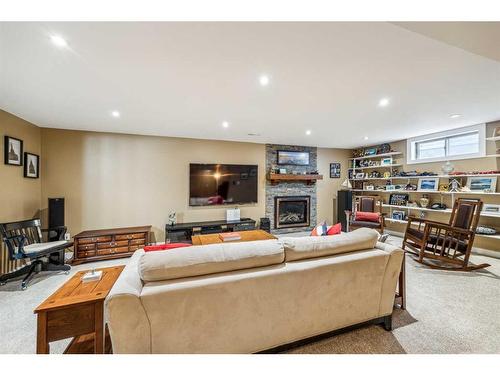 584 Bracewood Drive Sw, Calgary, AB - Indoor With Fireplace