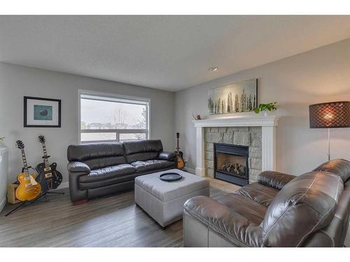 20 Tuscany Ravine Court Nw, Calgary, AB - Indoor Photo Showing Living Room With Fireplace