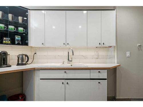 1048 Deer River Circle Se, Calgary, AB - Indoor Photo Showing Kitchen With Double Sink
