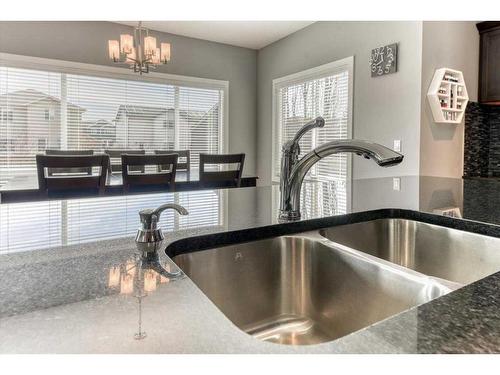 108 Wildrose Crescent, Strathmore, AB - Indoor Photo Showing Kitchen With Double Sink