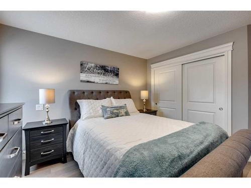 122 Sundown Close Se, Calgary, AB - Indoor Photo Showing Bedroom