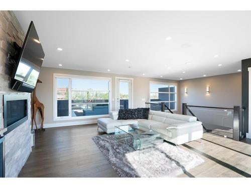 1822 18A Street Sw, Calgary, AB - Indoor Photo Showing Living Room With Fireplace