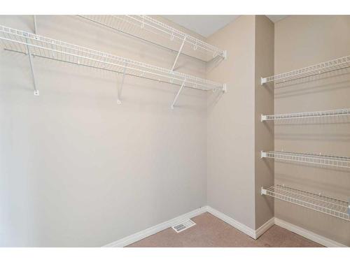 125 Valley Woods Place Nw, Calgary, AB - Indoor With Storage