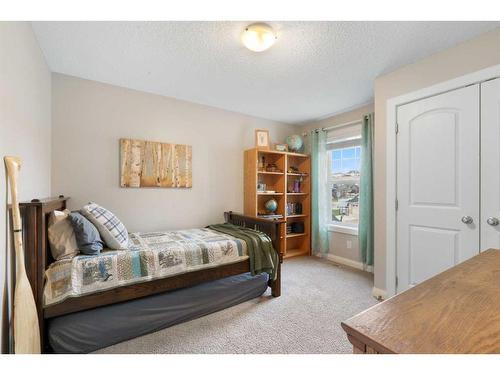 23 Westridge Way, Okotoks, AB - Indoor Photo Showing Bedroom