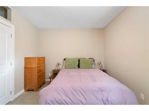 23 Westridge Way, Okotoks, AB - Indoor Photo Showing Bedroom