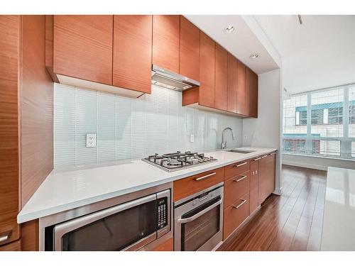 246-222 Riverfront Avenue Sw, Calgary, AB - Indoor Photo Showing Kitchen With Upgraded Kitchen