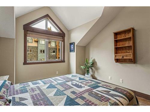 319-175 Crossbow Place, Canmore, AB - Indoor Photo Showing Bedroom