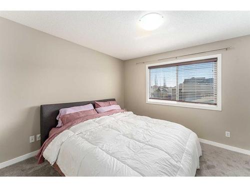 1587 New Brighton Drive Se, Calgary, AB - Indoor Photo Showing Bedroom