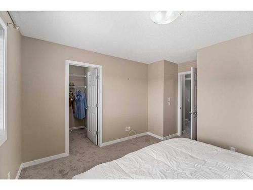 1587 New Brighton Drive Se, Calgary, AB - Indoor Photo Showing Bedroom