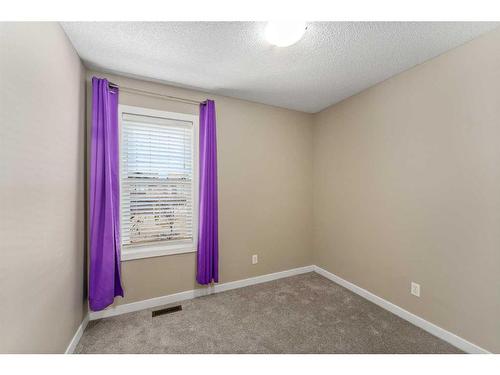 1587 New Brighton Drive Se, Calgary, AB - Indoor Photo Showing Other Room