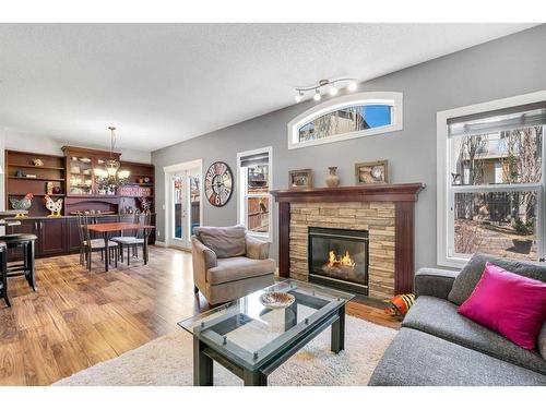 20 Covepark Mews Ne, Calgary, AB - Indoor Photo Showing Living Room With Fireplace