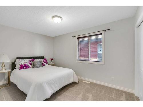 20 Covepark Mews Ne, Calgary, AB - Indoor Photo Showing Bedroom