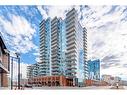 308-519 Riverfront Avenue Se, Calgary, AB  - Outdoor With Balcony With Facade 