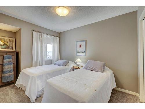115 Brightoncrest Terrace Se, Calgary, AB - Indoor Photo Showing Bedroom