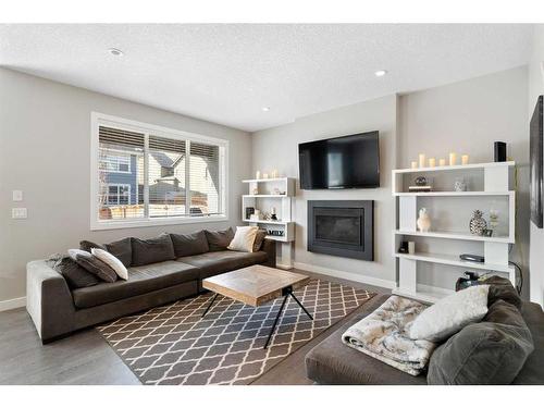 53 Masters Place Se, Calgary, AB - Indoor Photo Showing Living Room With Fireplace