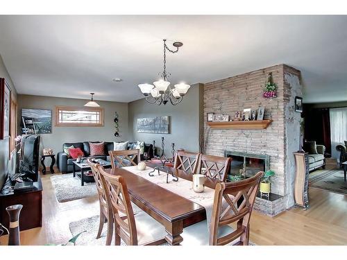 7816 7 Street Sw, Calgary, AB - Indoor Photo Showing Dining Room With Fireplace