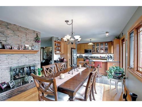 7816 7 Street Sw, Calgary, AB - Indoor Photo Showing Dining Room With Fireplace