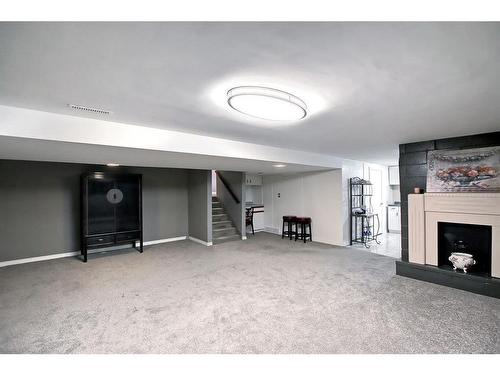 7816 7 Street Sw, Calgary, AB - Indoor With Fireplace