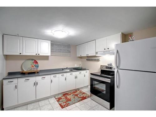 7816 7 Street Sw, Calgary, AB - Indoor Photo Showing Kitchen With Double Sink