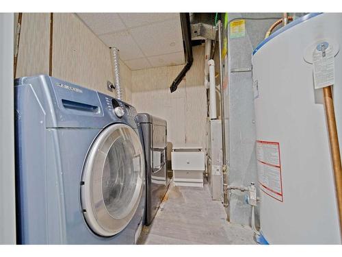 7 Templeby Road Ne, Calgary, AB - Indoor Photo Showing Laundry Room