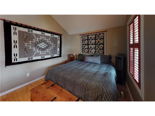 424 Third Street West, Cochrane, AB - Indoor Photo Showing Bedroom