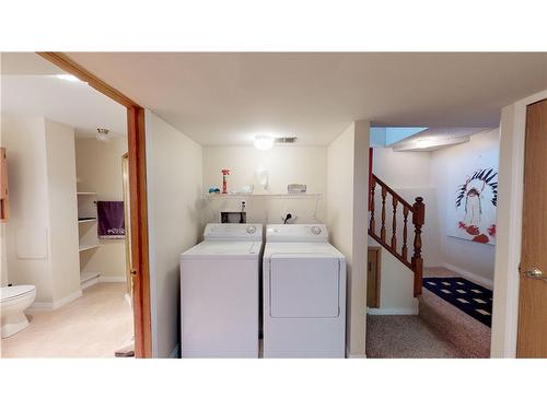 424 Third Street West, Cochrane, AB - Indoor Photo Showing Laundry Room