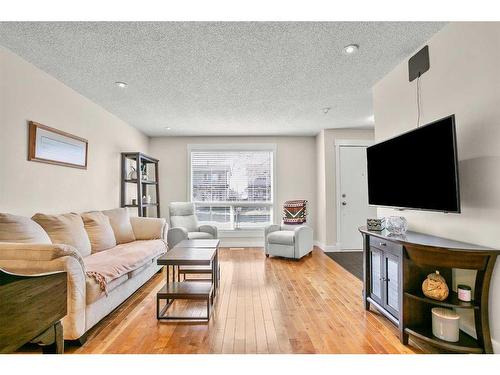19 Erin Park Bay Se, Calgary, AB - Indoor Photo Showing Living Room