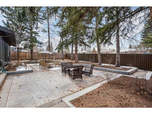 228 Pump Hill Gardens Sw, Calgary, AB - Outdoor With Backyard