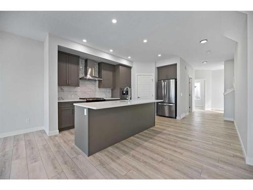 225 Chelsea Place, Chestermere, AB - Indoor Photo Showing Kitchen With Upgraded Kitchen