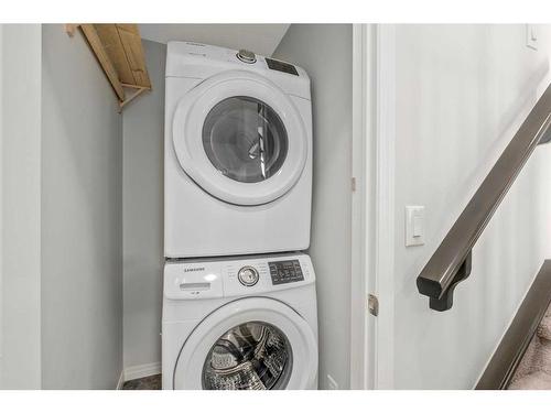 144 Windford Grove Sw, Airdrie, AB - Indoor Photo Showing Laundry Room