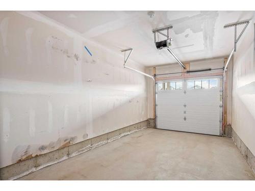 144 Windford Grove Sw, Airdrie, AB - Indoor Photo Showing Garage