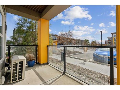 104-19621 40 Street Se, Calgary, AB - Outdoor With Balcony With Exterior