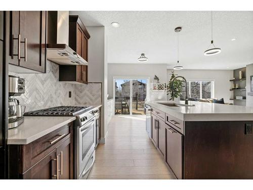 49 Cougar Ridge Close Sw, Calgary, AB - Indoor Photo Showing Kitchen With Upgraded Kitchen