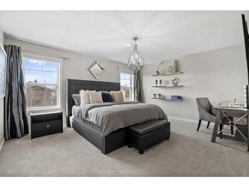 49 Cougar Ridge Close Sw, Calgary, AB - Indoor Photo Showing Bedroom