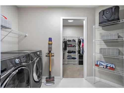 49 Cougar Ridge Close Sw, Calgary, AB - Indoor Photo Showing Laundry Room