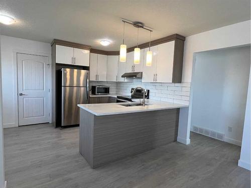 6132 Madigan Drive Ne, Calgary, AB - Indoor Photo Showing Kitchen With Stainless Steel Kitchen With Upgraded Kitchen