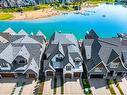 222 Marine Drive Se, Calgary, AB  - Outdoor With Body Of Water With Facade 