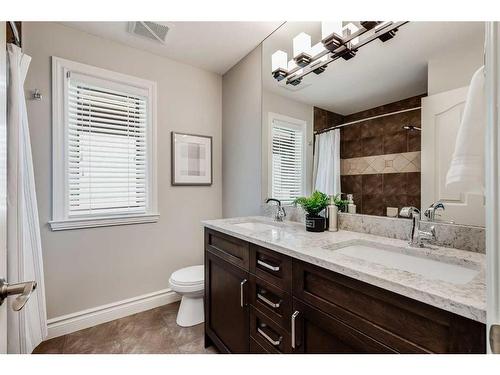 16 Coulee Park Sw, Calgary, AB - Indoor Photo Showing Bathroom