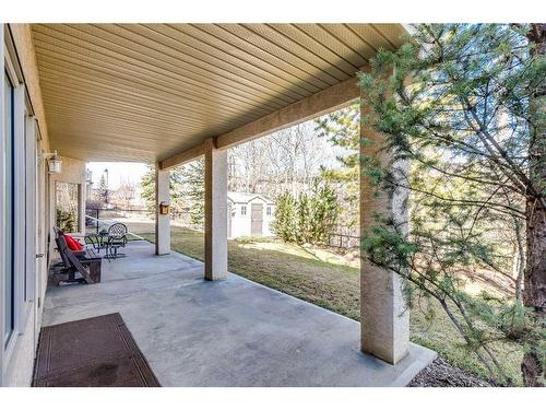 16 Coulee Park Sw, Calgary, AB - Outdoor With Deck Patio Veranda With Exterior