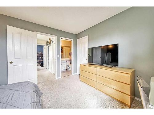 34 Cramond Crescent Se, Calgary, AB - Indoor Photo Showing Bedroom