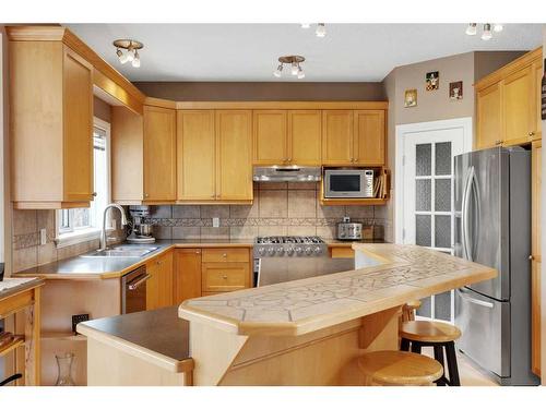 163 Strathridge Place Sw, Calgary, AB - Indoor Photo Showing Kitchen