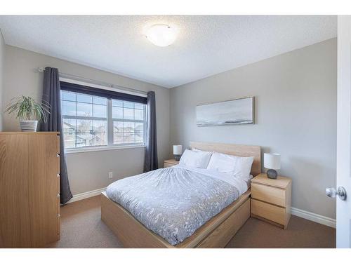 104 Prestwick Manor Se, Calgary, AB - Indoor Photo Showing Bedroom