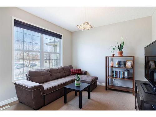 104 Prestwick Manor Se, Calgary, AB - Indoor Photo Showing Living Room
