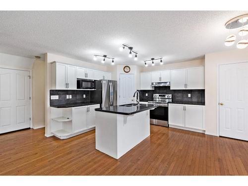 196 Everwillow Green Sw, Calgary, AB - Indoor Photo Showing Kitchen With Stainless Steel Kitchen