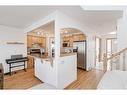 89 Cramond Crescent Se, Calgary, AB  - Indoor Photo Showing Kitchen With Double Sink 
