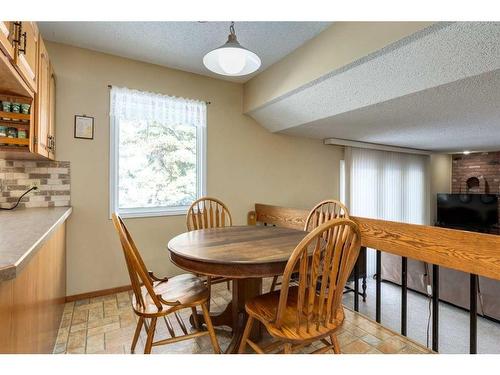 10727 Willowfern Drive Se, Calgary, AB - Indoor Photo Showing Dining Room