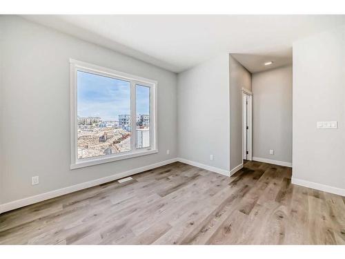 450 Shawnee Square Sw, Calgary, AB - Indoor Photo Showing Other Room