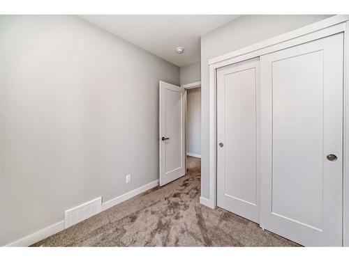 450 Shawnee Square Sw, Calgary, AB - Indoor Photo Showing Laundry Room