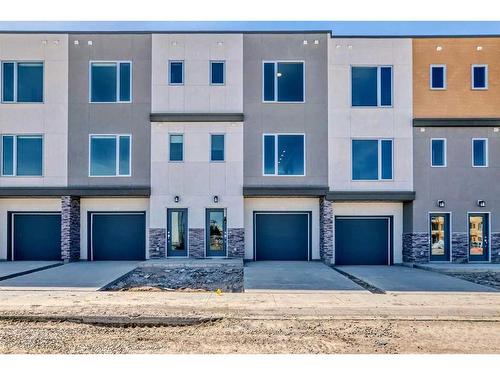 450 Shawnee Square Sw, Calgary, AB - Outdoor With Facade
