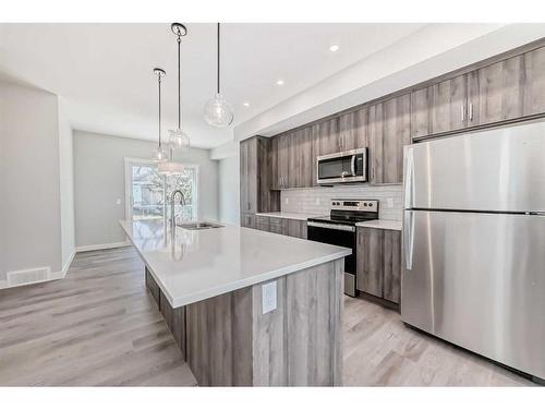 450 Shawnee Square Sw, Calgary, AB - Indoor Photo Showing Kitchen With Upgraded Kitchen